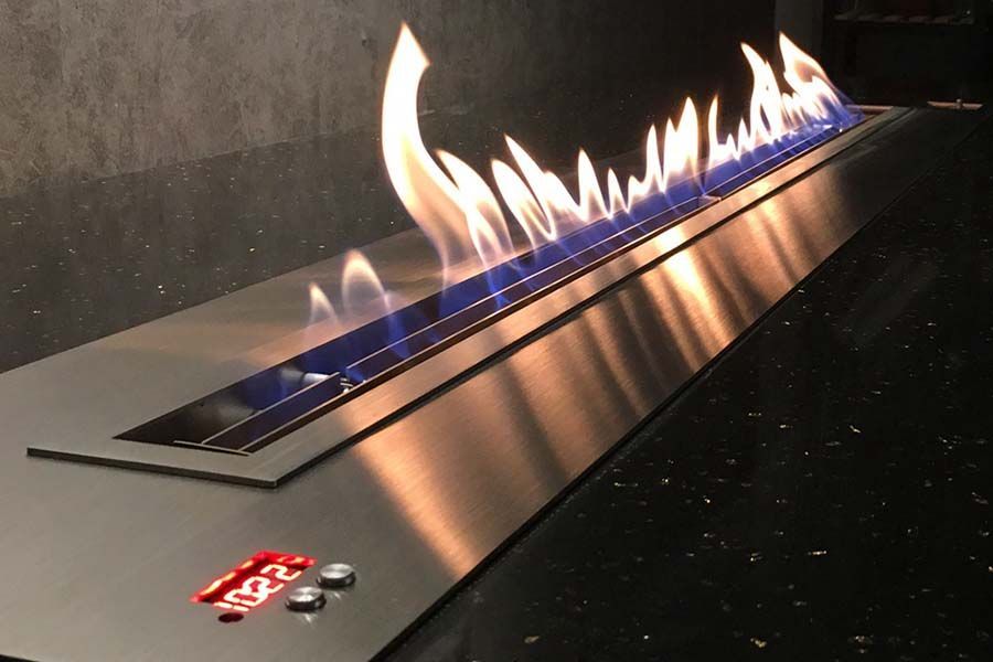 An automatic, remote controlled bio ethanol fire place. 